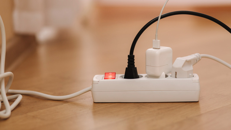 Power strip with plugged-in cords