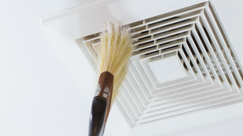 cleaning air vent with brush