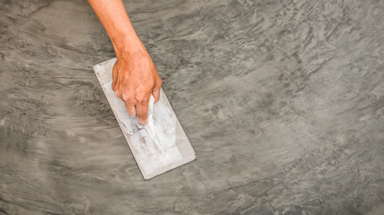 Steel trowel on concrete floor