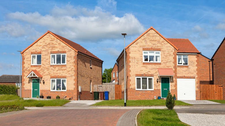 Two similar two-story houses 