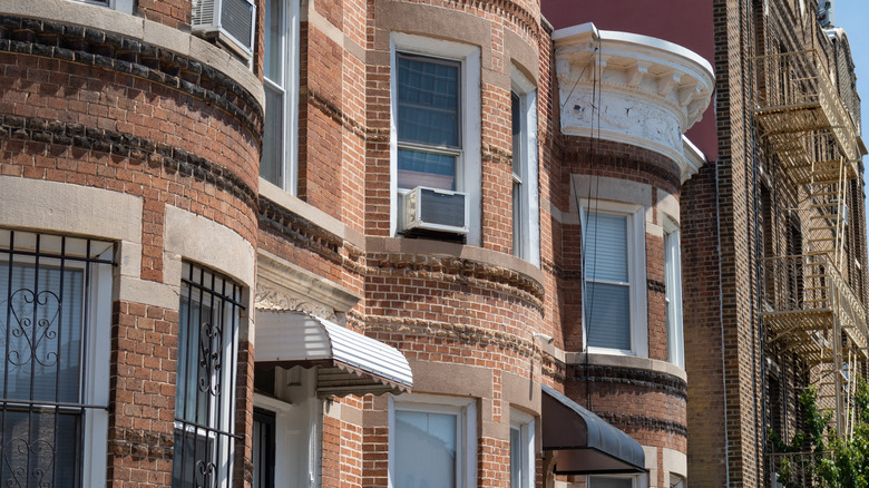 brownstone home with window air conditioner