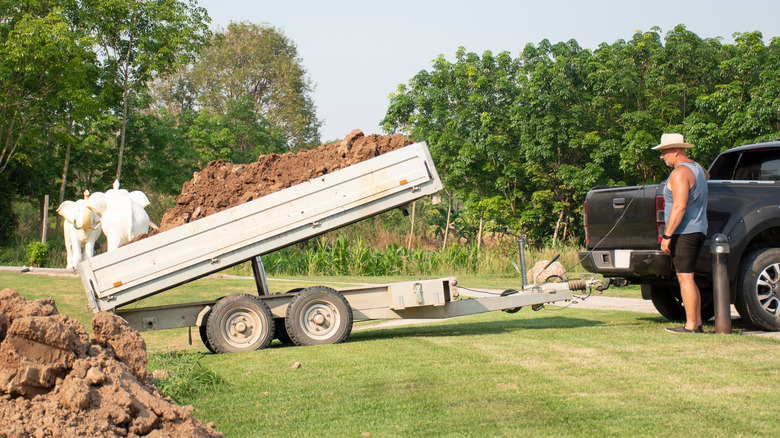 trailer filled with dirt 