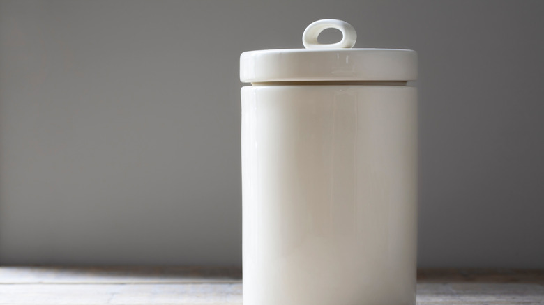 White cookie canister on counter