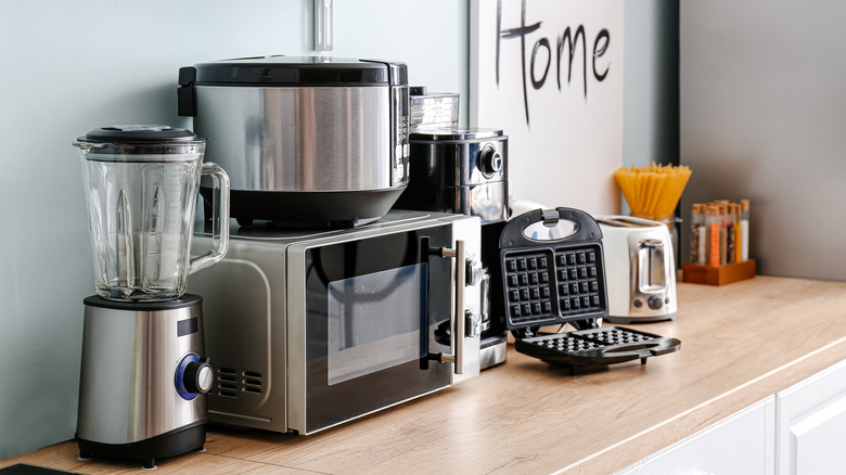 various kitchen appliances, microwave blender