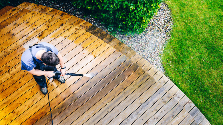 Person cleaning the patio