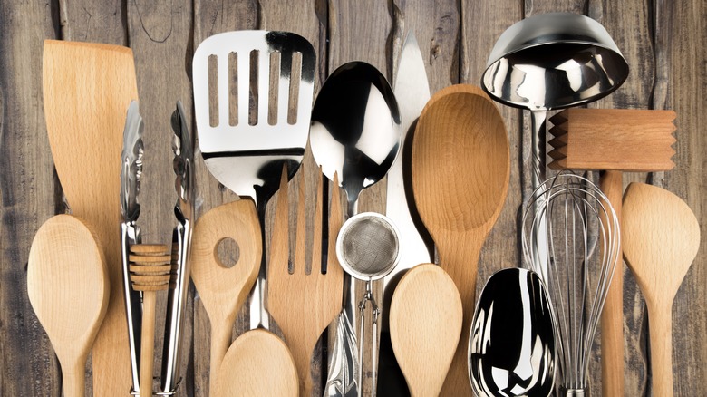 wooden and stainless kitchen utensils