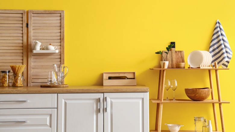 Kitchen with bright yellow walls