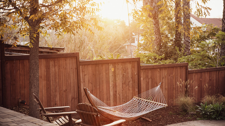 Wood fence in a sloped backyard