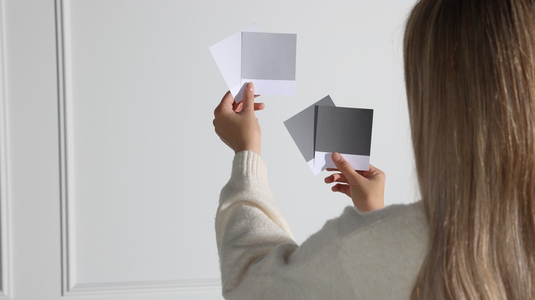 woman with paint swatches