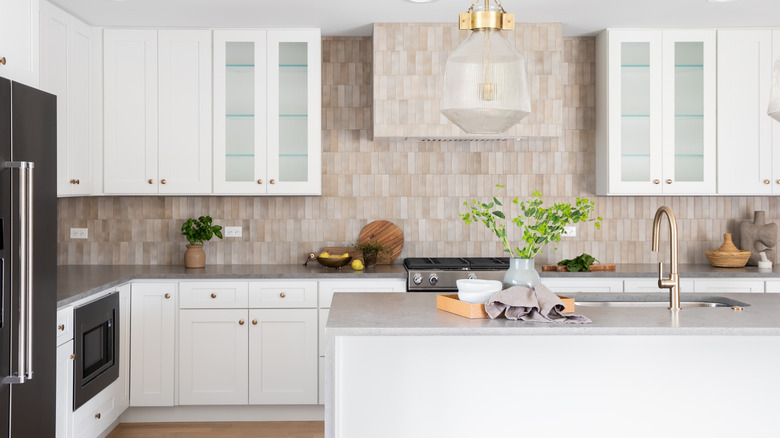 vertical clay tile kitchen backsplash