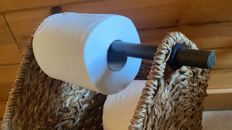 toilet rolls in basket holder