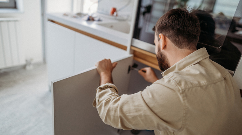 Taking cabinet doors off their hinges