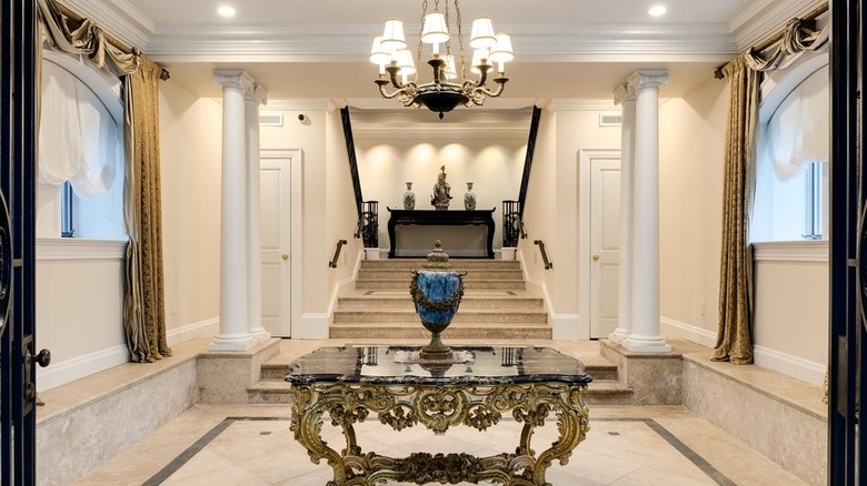 Marble foyer with chandelier