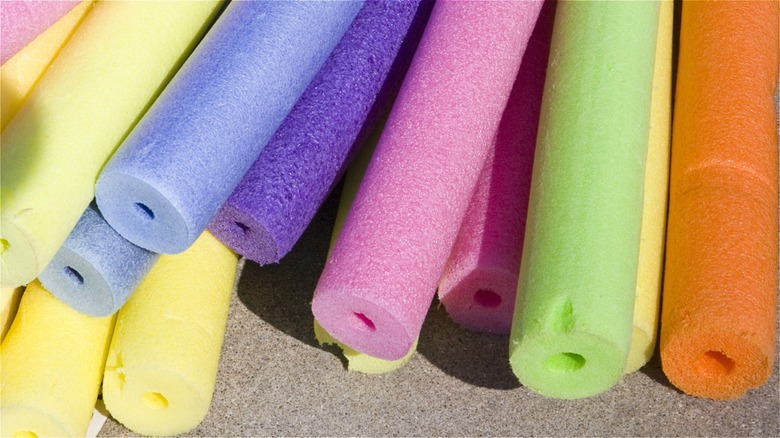 pile of colorful pool noodles