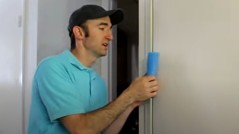 pool noodle in door jamb