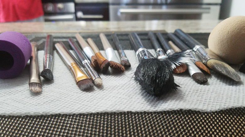 makeup brushes on a counter