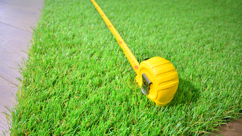 Measuring tape on the grass