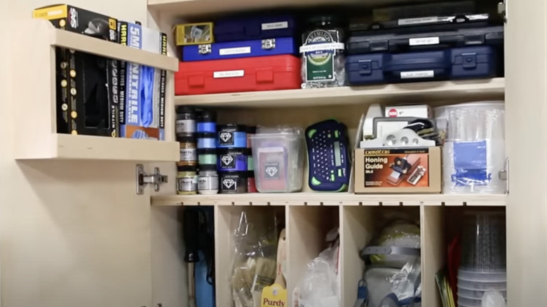 Custom cabinet with spaces for tools and supplies