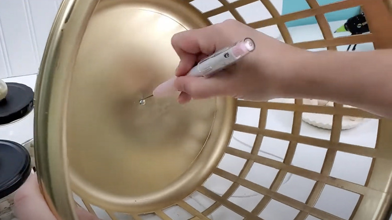 cutting hole in laundry basket