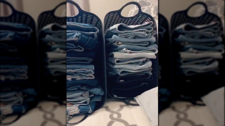 Jeans stacked in baskets