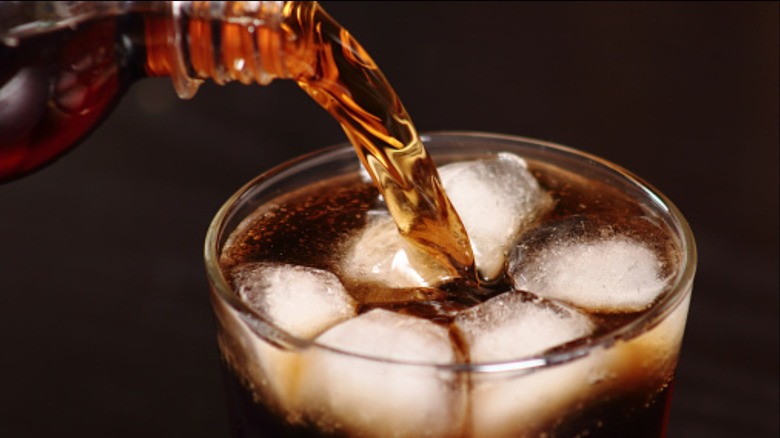 soda pouring into glass