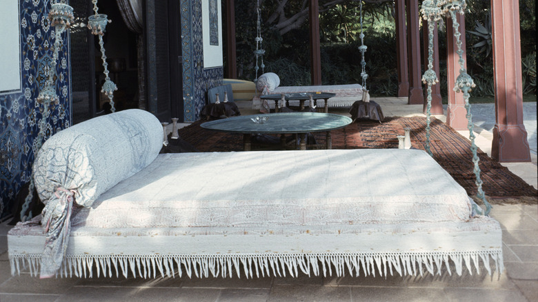 Hanging bed on porch