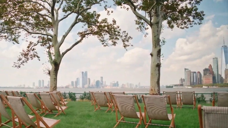 Chairs on lawn, city view