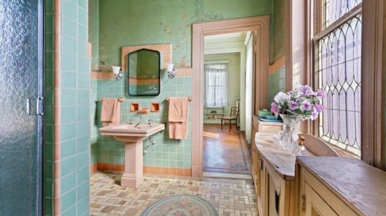 Vintage green tiled bathroom