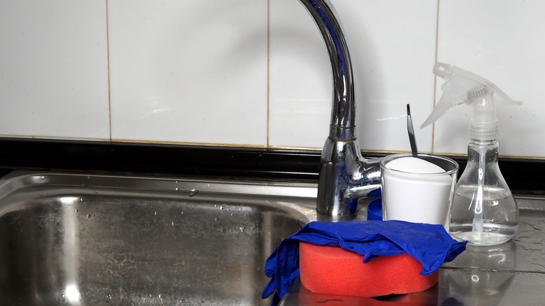 Baking soda near steel sink