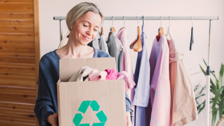 Woman donating clothing