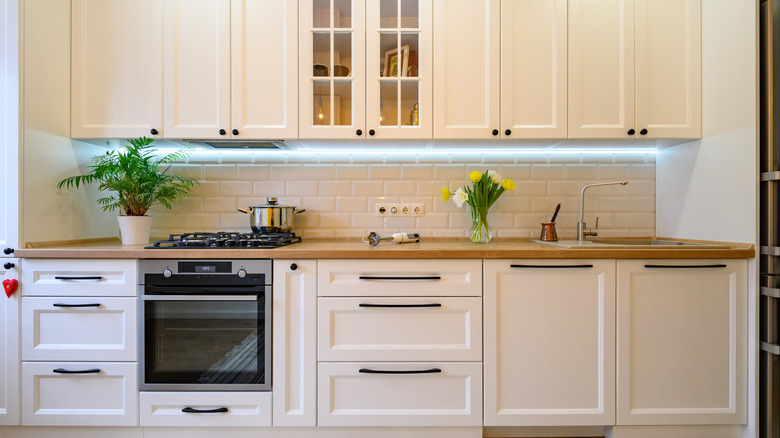 Clean white kitchen cabinets