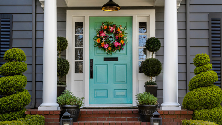 turquoise painted home front door