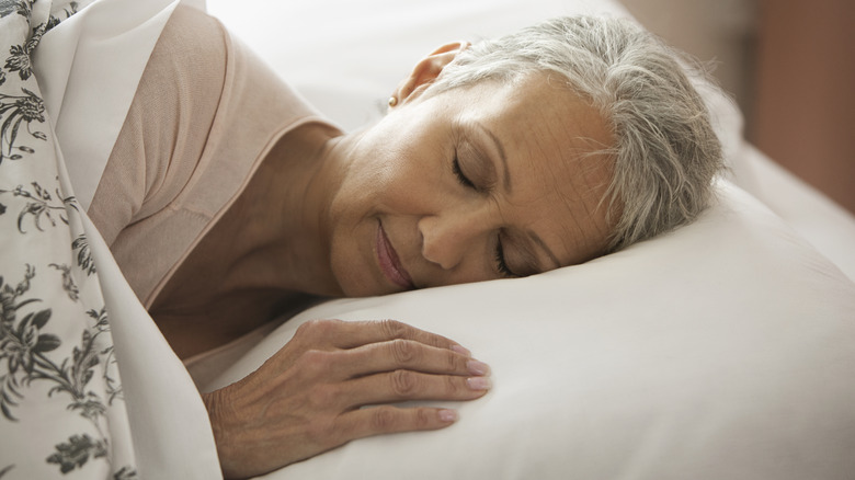 Woman sleeping in bed