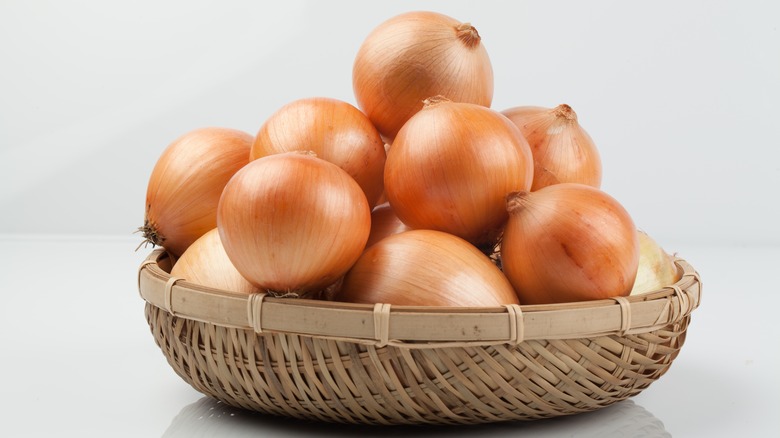 Onions in a wicker bowl