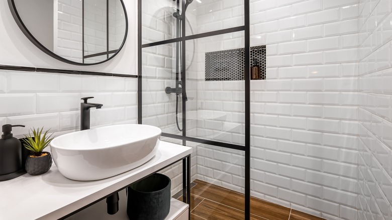 https://www.housedigest.com/img/gallery/this-latest-bathroom-trend-favors-aesthetic-over-practicality/intro-1667662990.jpg