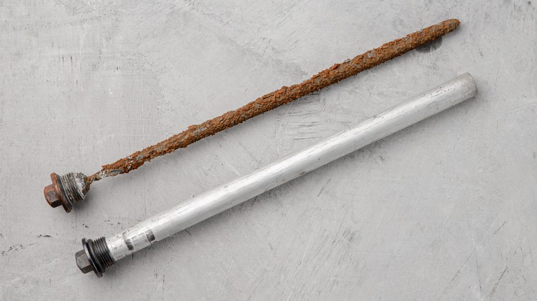 New and old anode rod