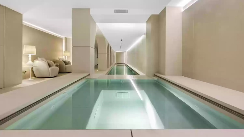 indoor basement pool with lounge