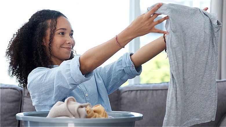 Person smiling at clean shirt