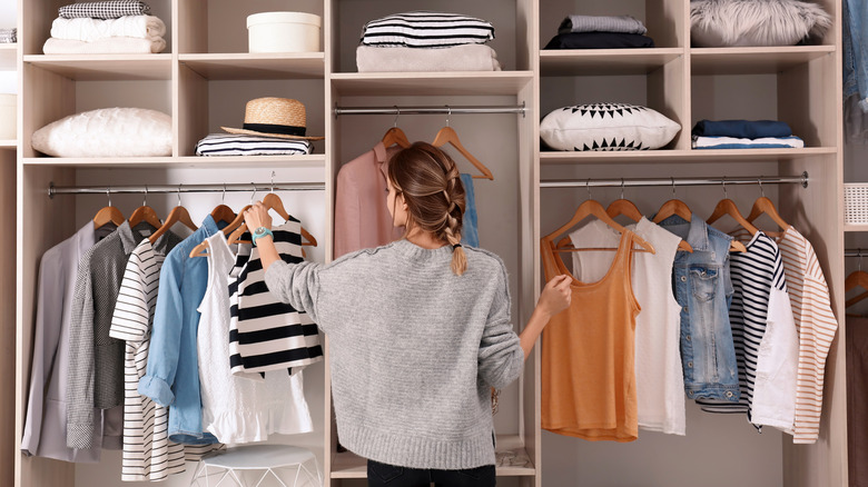 Woman hanging clothes