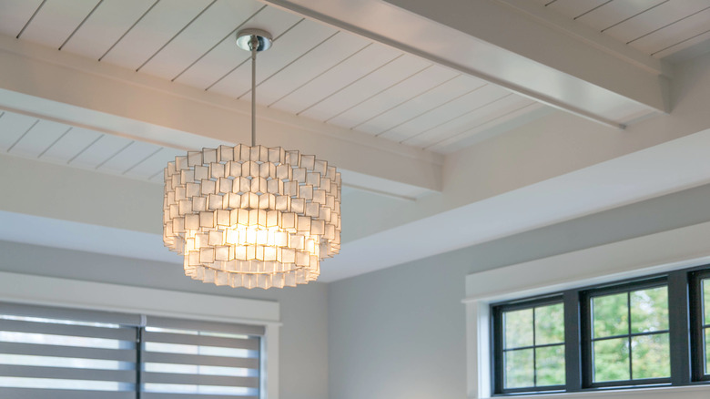 Shiplap ceiling with beam accents