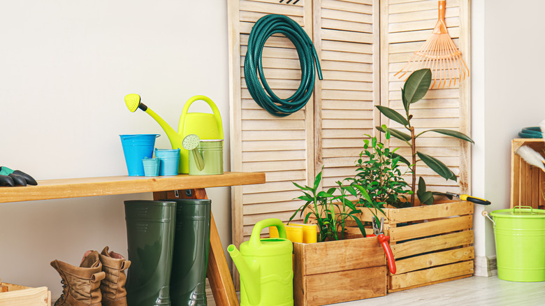 garage with gardening tools