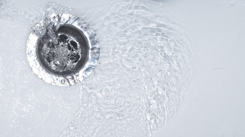 bathtub draining with water 