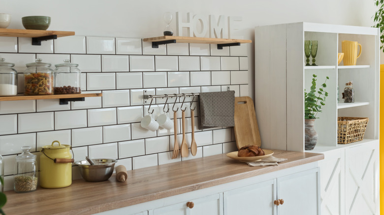 White kitchen with open shelves