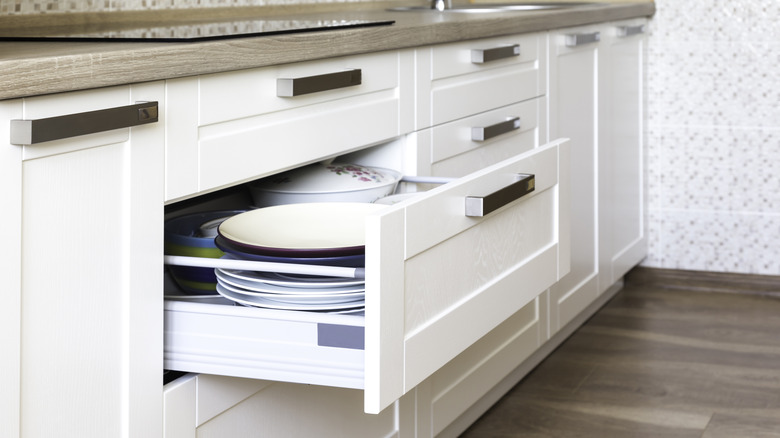 Drawer stacked with plates 