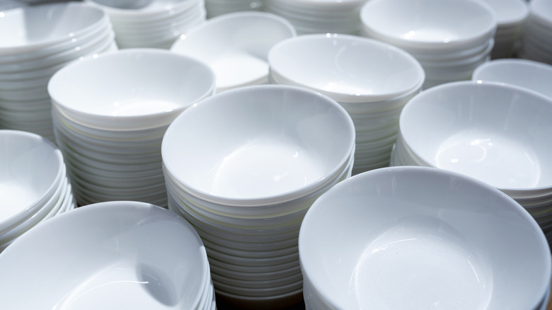 Stacks of white plates