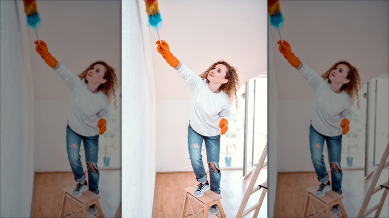 woman falling off ladder