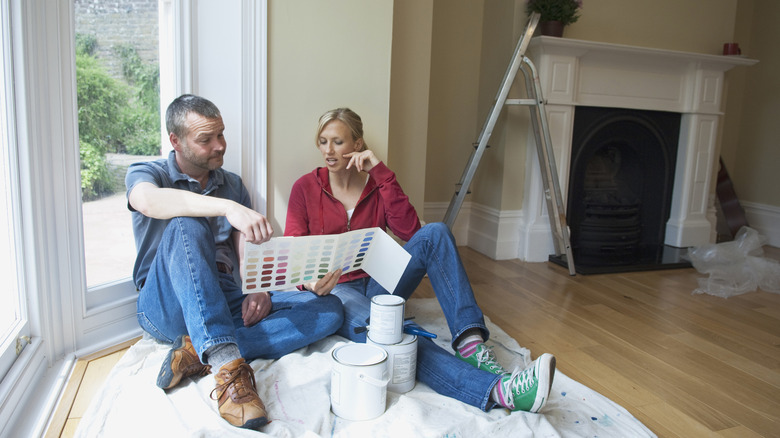 couple choosing paint color