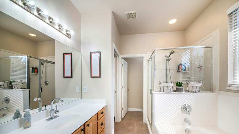 Hollywood light fixture in bathroom