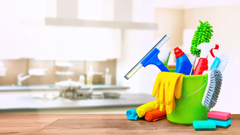 cleaning products in a bucket