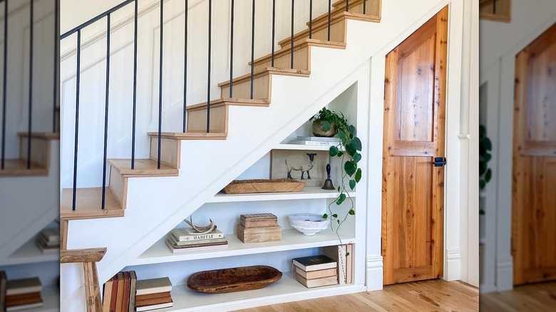 Door and shelves under stairs